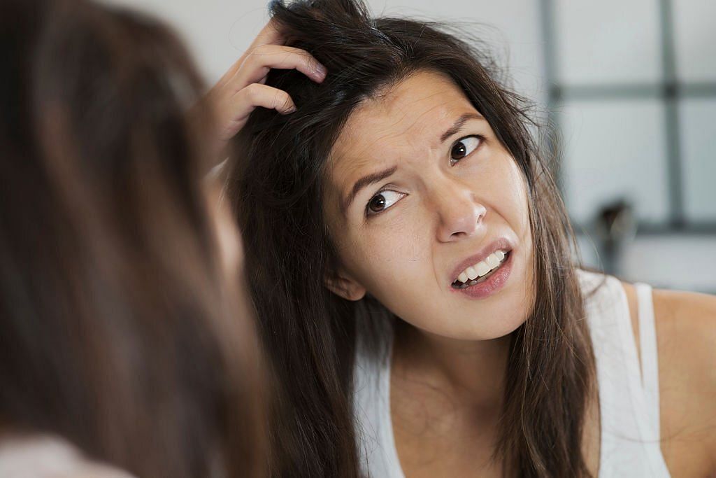 Stress and dandruff (Image via iStockPhoto)